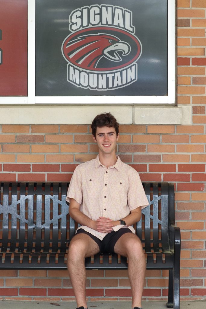 A student poses for a photo